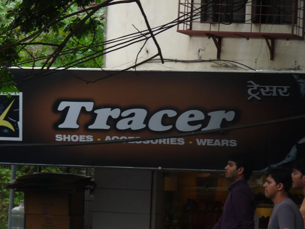 Tracer shop fascia in Pune, a finished modern board.